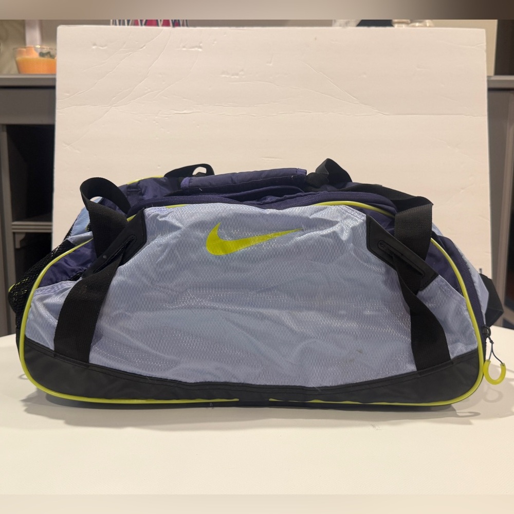 Nike Men's Blue and Black Duffel Bag with Yellow Accents